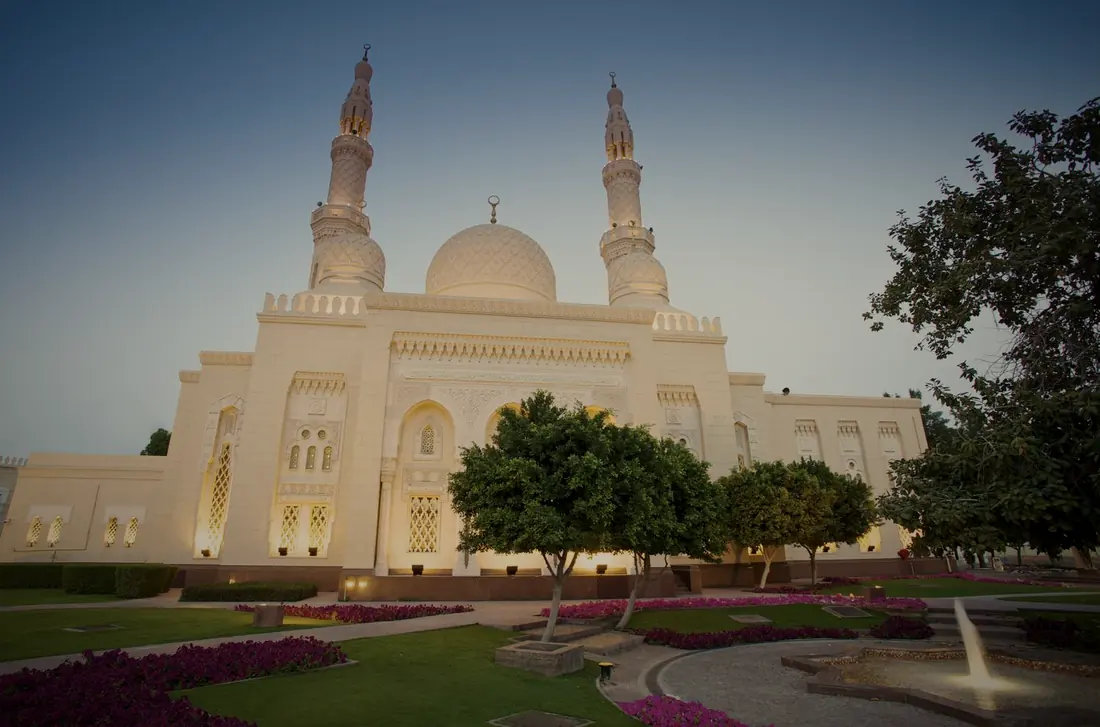 Jumeirah Mosque in white stone, with its garden in front
