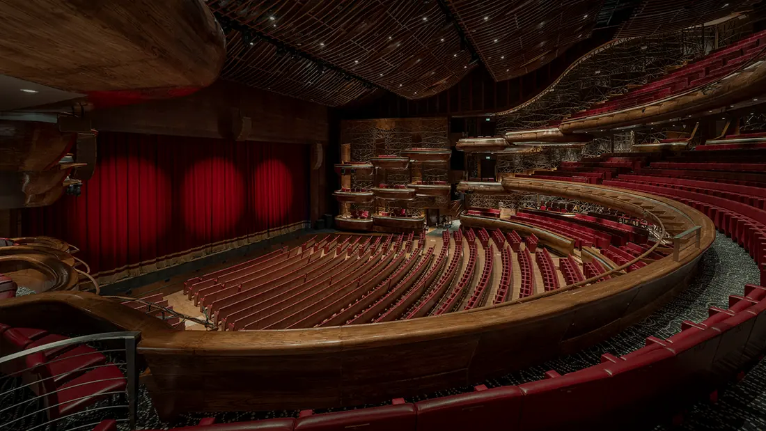 The red and wood auditorium of Dubai Opera